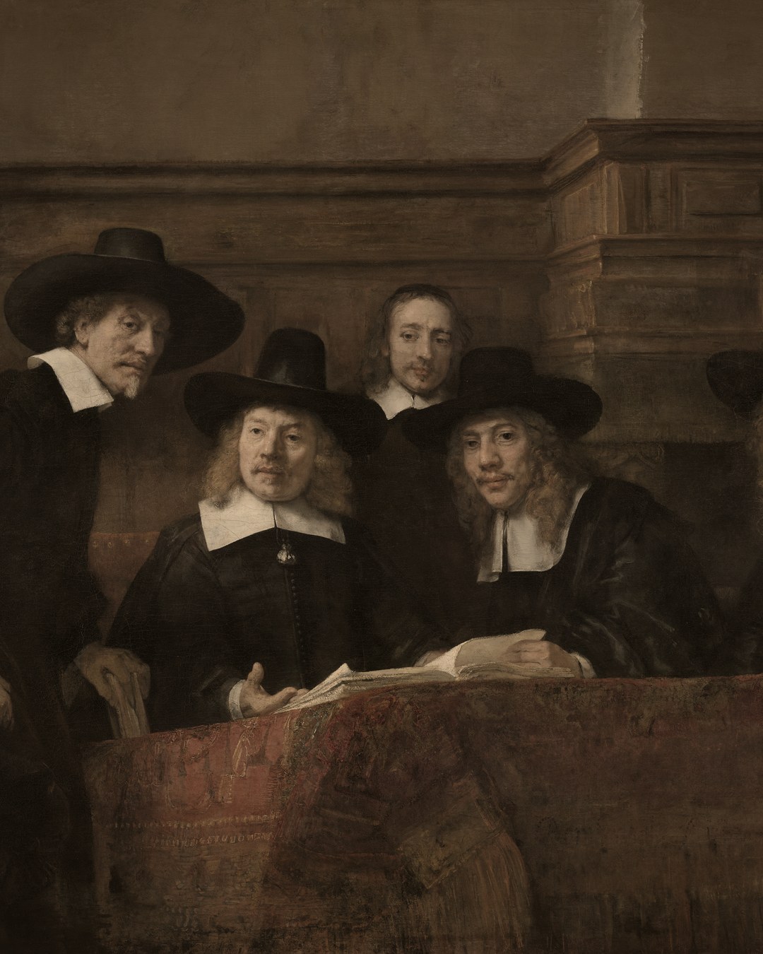 Rembrandt, The Syndics of the Drapers Guild, 1662: the board seated at a table with the sample book open, directors under audit